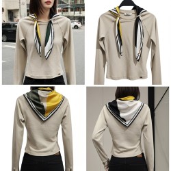 توب قصير بأكمام طويلة مع تفصيل وشاح على الرقبة توب قصير بأكمام طويلة مع تفصيل وشاح على الرقبة